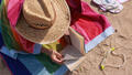 Image d'illustration lecture à la plage